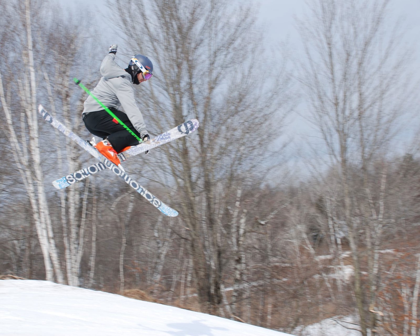 Skier catching air at Paul Bunyan Ski Hill